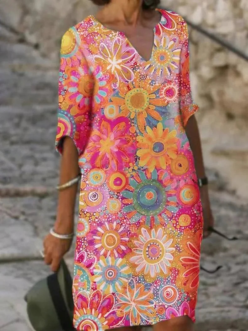 Delia - zomerjurk met halve mouwen en bloemenprint