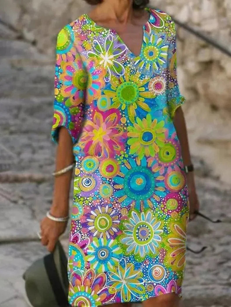 Delia - zomerjurk met halve mouwen en bloemenprint