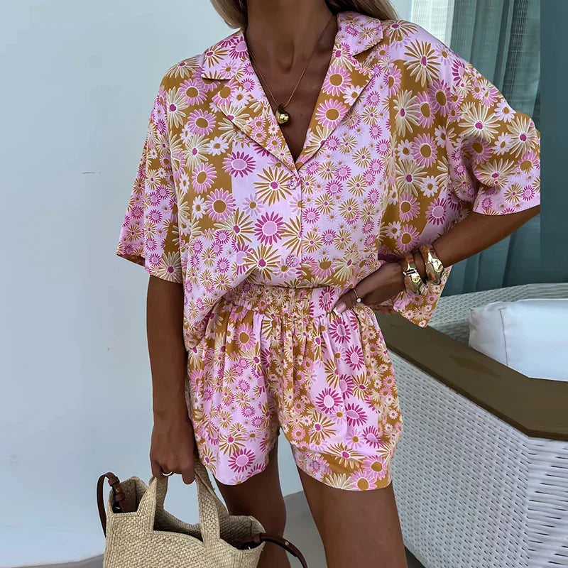 Yasmine - bloemen playsuit met riem