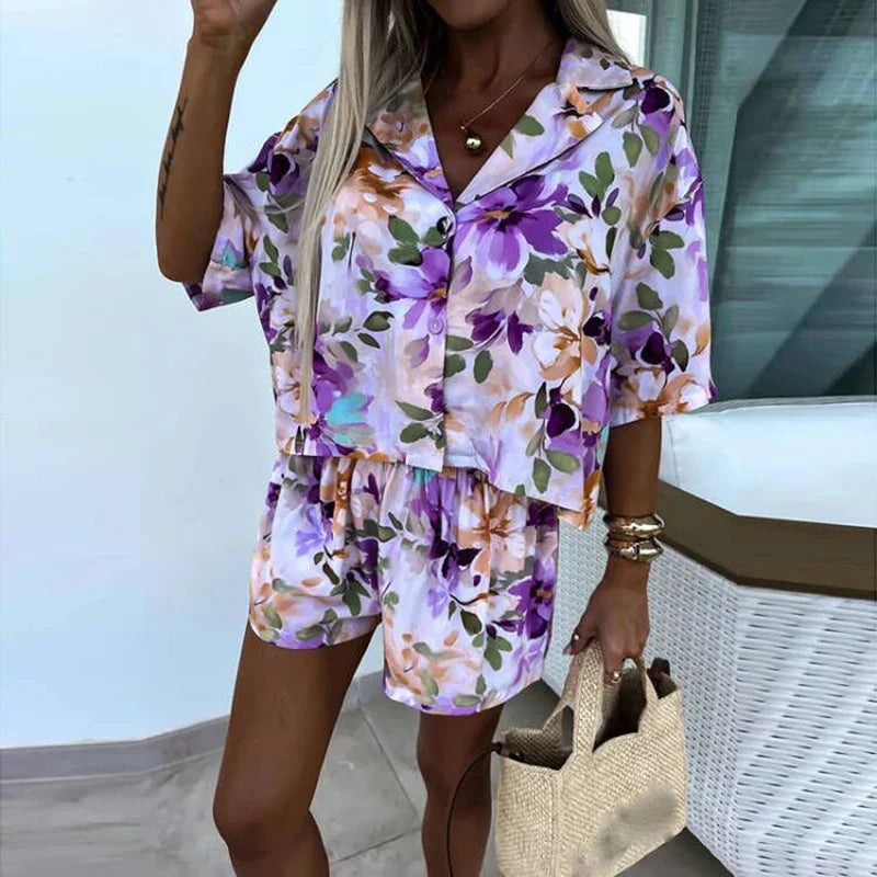 Yasmine - bloemen playsuit met riem