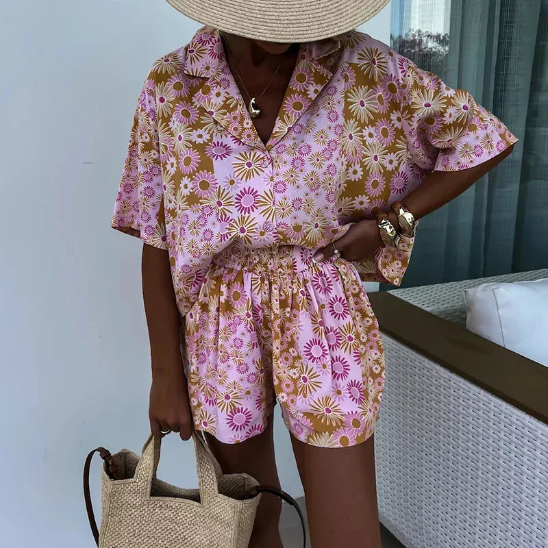 Yasmine - bloemen playsuit met riem