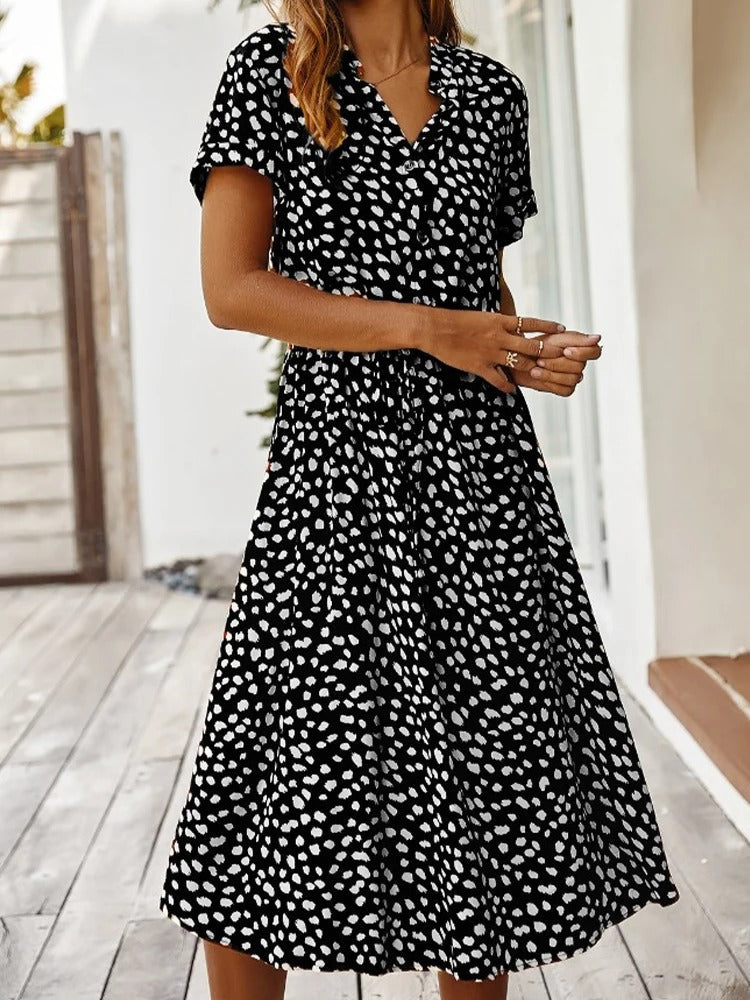 Doris - stijlvolle midi-jurk met elastische tailleprint