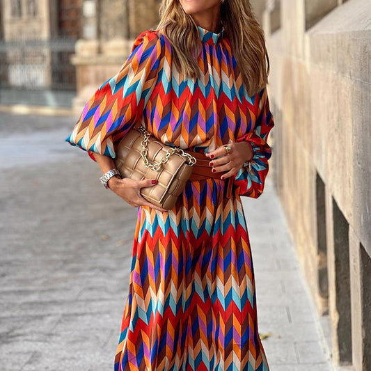 Celine - elegante midi-jurk met lange mouwen en veelkleurig patroon