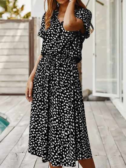 Doris - stijlvolle midi-jurk met elastische tailleprint