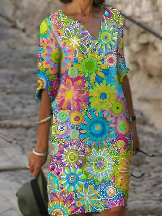 Delia - zomerjurk met halve mouwen en bloemenprint