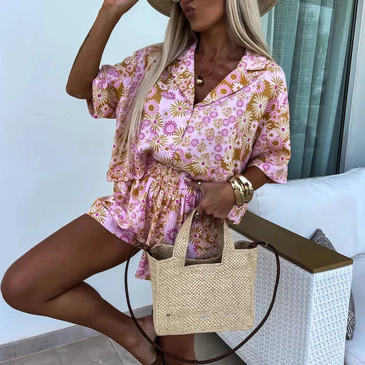 Yasmine - bloemen playsuit met riem