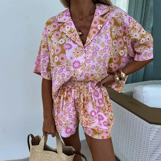 Yasmine - bloemen playsuit met riem