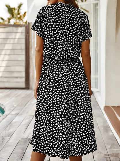 Doris - stijlvolle midi-jurk met elastische tailleprint